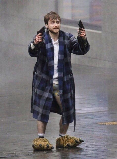 Create meme "guns akimbo, Daniel Radcliffe with guns in a Bathrobe, Daniel Radcliffe guns akimbo ...