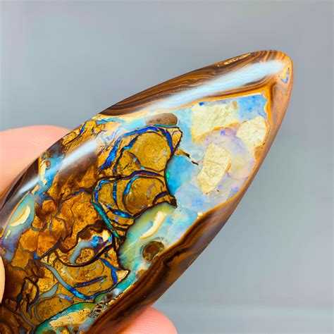 Boulder opal - ladegloan