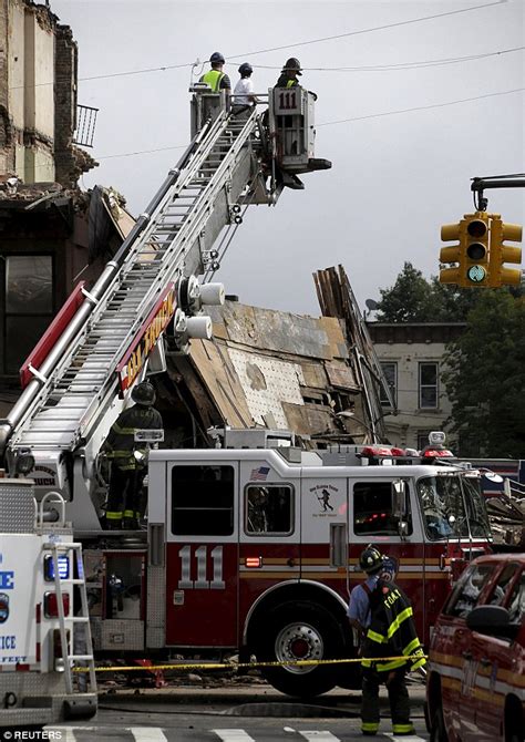 Brooklyn building collapse flying debris injures three | Daily Mail Online