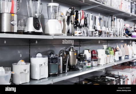 Assortment of a kitchen appliances blenders and juicers at household ...