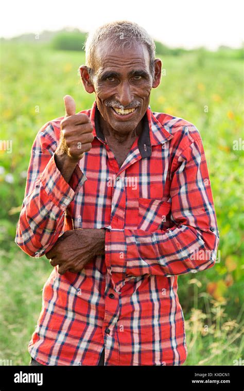 1 Indian Rural Farmer Old man Showing Thumbsup Standing Farm Stock Photo - Alamy