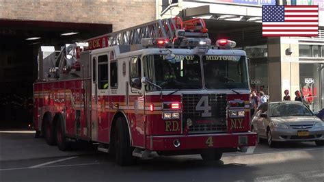 FDNY Ladder 4 fire truck responding with siren and lights - YouTube