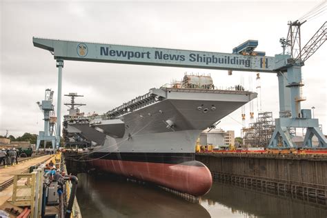 HUNTINGTON INGALLS INDUSTRIES FLOODS DRY DOCK IN PREPARATION FOR CHRISTENING OF AIRCRAFT CARRIER ...