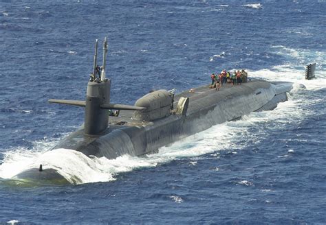 Marines assemble a combat rubber raiding craft aboard USS Ohio (SSGN ...