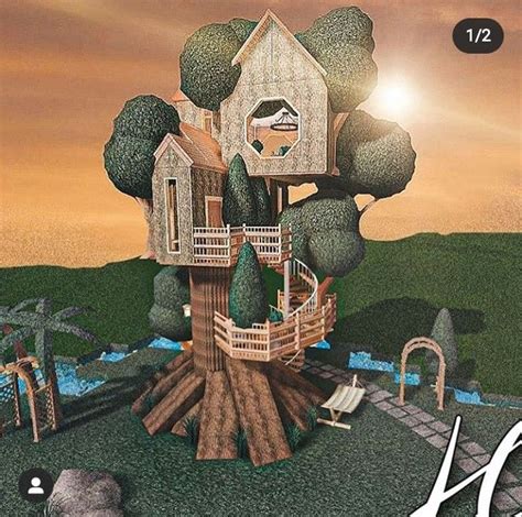 an image of a tree house on top of a hill