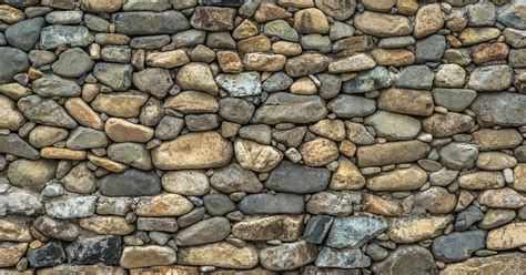 photo of brown and black stone wall #stone #wall #damme stone wall # ...