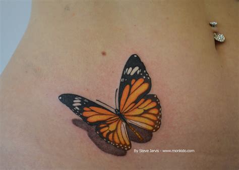 Monki Do Tattoo Studio: Orange and Black Butterfly Tattoo