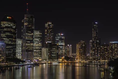 Architectural photography of high-rise buildings near the body of water ...