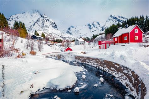 Snowy winter cityscape of Nusfjord town. Fabulous landscape of Norway ...