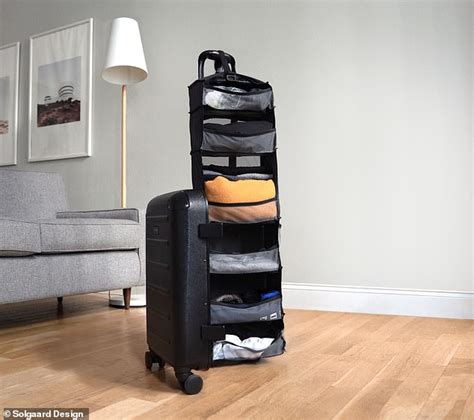 The incredible carry-on suitcase that can be folded out into a wardrobe | Daily Mail Online