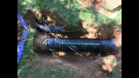 Repairing an 8 inch corrugated pipe - YouTube