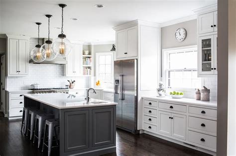 White Cabinets with Charcoal Gray Kitchen Island - Transitional - Kitchen