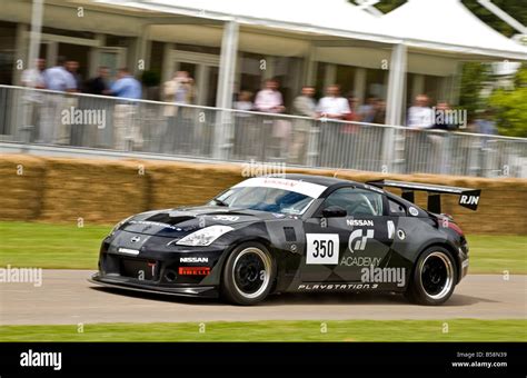 2004 Nissan 350Z GT4 with driver Carlos Tavares at Goodwood Festival of Speed, Sussex, UK Stock ...