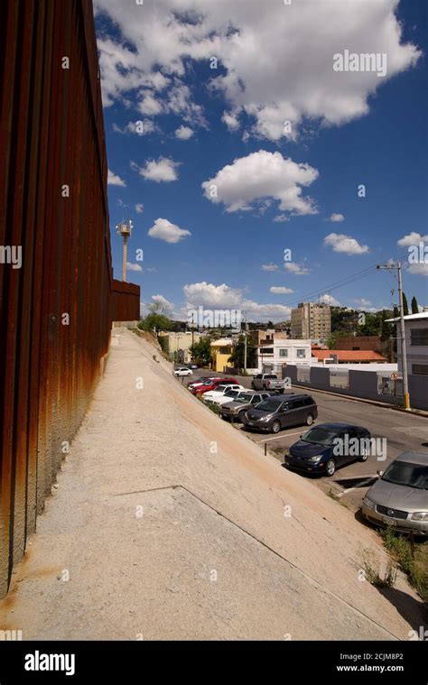 The border wall with Nogales, Arizona, USA, in Nogales, Sonora, Mexico ...