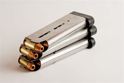 1911 Magazines stock photo. Image of bullets, chrome, brass - 9699796