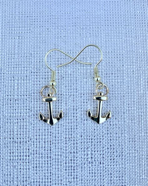 Gold Anchor Small Dangle Earrings by BeeTheLightJewelry on Etsy https://www.etsy.com/listing ...