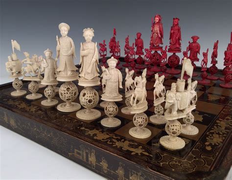 ANTIQUE CHINESE LACQUER BOARD AND IVORY CHESS SET