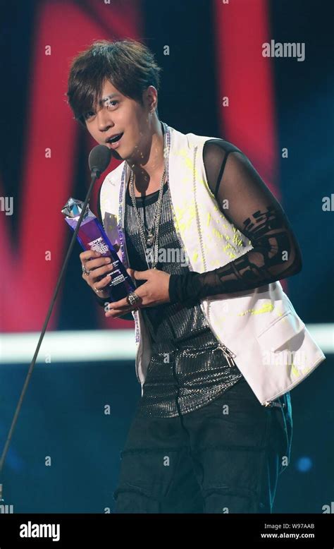 Taiwanese singer and actor Show Lo speaks after being awarded the trophy for the most popular ...