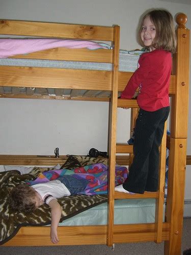 Bed + monkey bars = bunk bed | Cammy got a bottom bunk. | Flickr