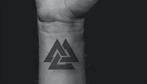 Three Triangle Tattoo Meaning & Symbolism (Christianity) Valknut Tattoo