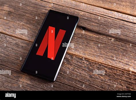 Netflix company logo on the smartphone screen Stock Photo - Alamy