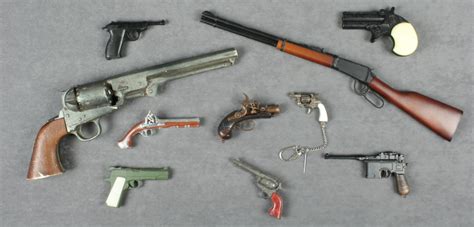 Bonanza lot of dozens of miniature toy guns; hours of fun for the ...