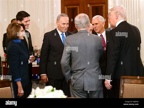 Washington, DC, USA. 23rd Jan, 2017. United States President Donald Trump, right, hosts a ...