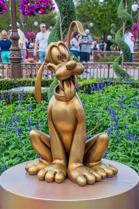 Pluto Gold Statue 50th Anniversary Disney Editorial Photography - Image ...