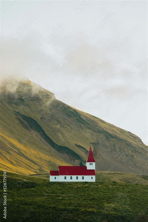 Landscape wallpaper of the Church of Vík í Mýrdal in Iceland in front ...