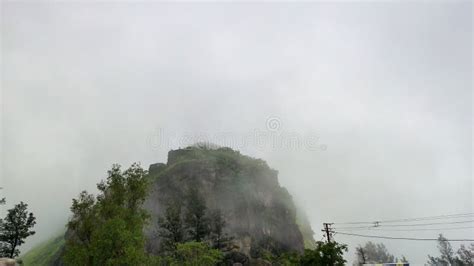 Sinhagad fort in monsoon stock photo. Image of ruins - 183422068