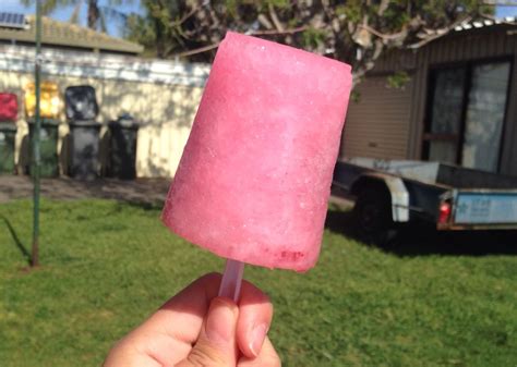 Delicious ice block by simply freezing a yummy soda with strawberries in a plastic cup💕 | Ice ...