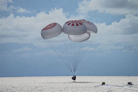 SpaceX capsule with world's first all-civilian orbital crew returns safely | Reuters