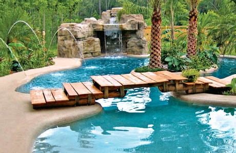 Ten affordable swimming pool grotto designs—in pictures—for your backyard