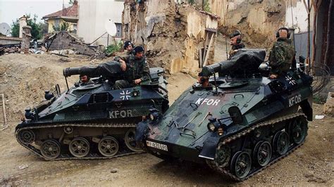 Two Wiesel AWC patrolling in Kosovo [1200x675] : r/MilitaryPorn