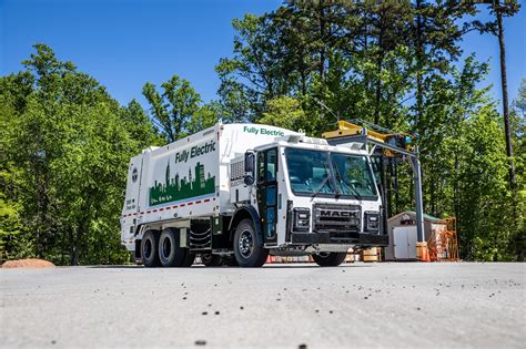 Check out these enormous electric garbage trucks | Popular Science