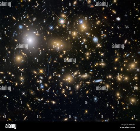 This image from the NASA/ESA Hubble Space Telescope shows the galaxy cluster MACSJ0717.5+3745 ...