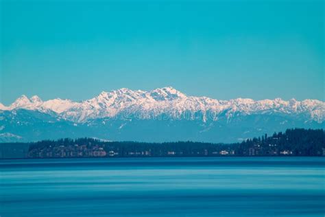 Long Exposure of the Olympia Mountains. Stock Photo - Image of beach, boulders: 141043058