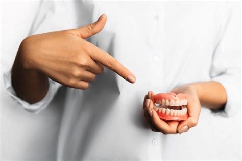 What are Snap-In Dentures? - Coral Dental Care