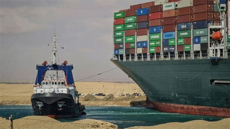 Efforts to dislodge stranded Suez Canal container ship intensify as ...