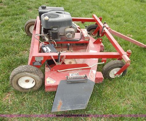 Swisher pull behind lawn mower in Gridley, KS | Item K7410 sold | Purple Wave