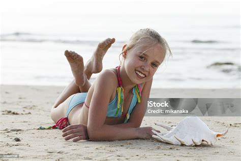 Teen Girl Lying On The Beach Stock Photo - Download Image Now - Girls ...