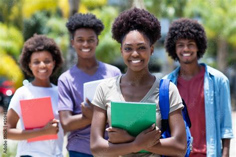 African female student with group of african american students Stock Photo | Adobe Stock