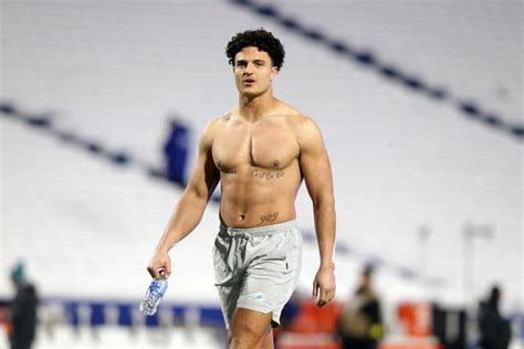 Dolphins' Jaelan Phillips warms up shirtless, throws snowballs pregame