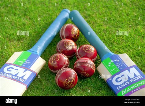 Cricket - Balls and Bats. Cricket bats and balls Stock Photo - Alamy