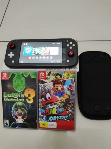 Nintendo Switch Lite + Mario Odyssey + Luigi mansion, Video Gaming ...