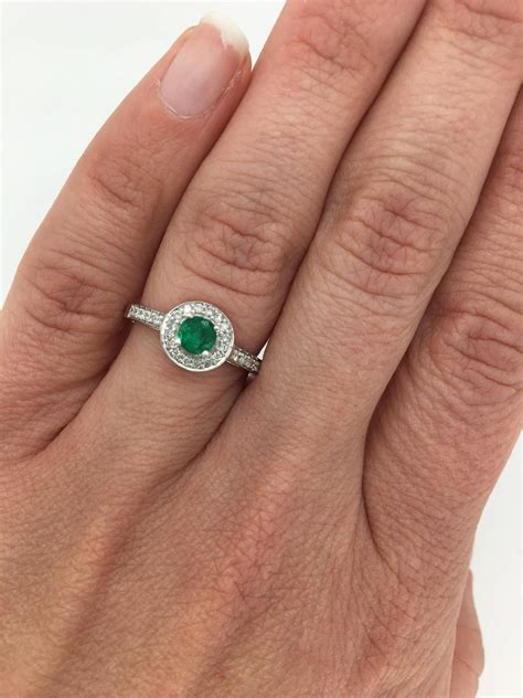 Emerald and Diamond Halo Ring at 1stDibs | emerald halo ring