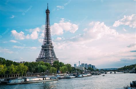 Premium Photo | View of tour eiffel tower and seine river, paris city attractions, france.