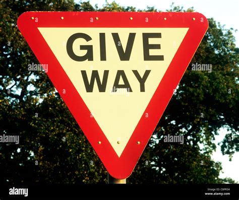 GIVE WAY Road Sign warning advisory English British signs England UK Stock Photo: 39839048 - Alamy