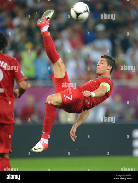 Portugal's Cristiano Ronaldo makes a bicycle-kick during UEFA EURO 2012 group B soccer match ...