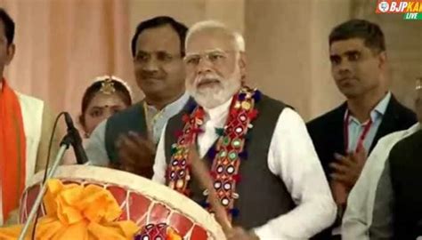 WATCH: Crowd cheers as PM Narendra Modi plays traditional drum during public rally in Karnataka ...